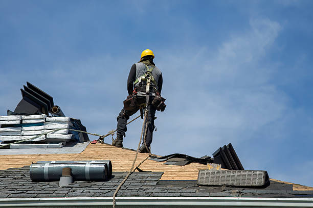 Professional Gutter Installation technician working in Elkins, NH
